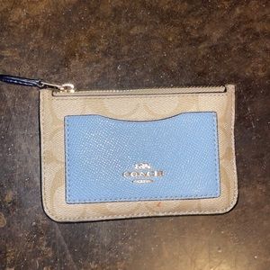 Coach wallet ~ gently used. Small paint removed second card slot. Had for years.